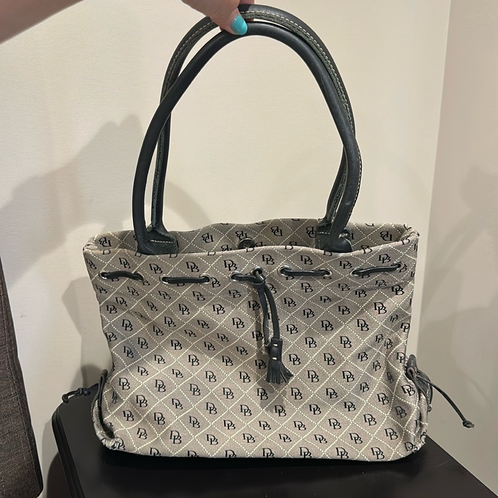dooney and bourke tote bag. Used but good condition.  Vintage canvas tote